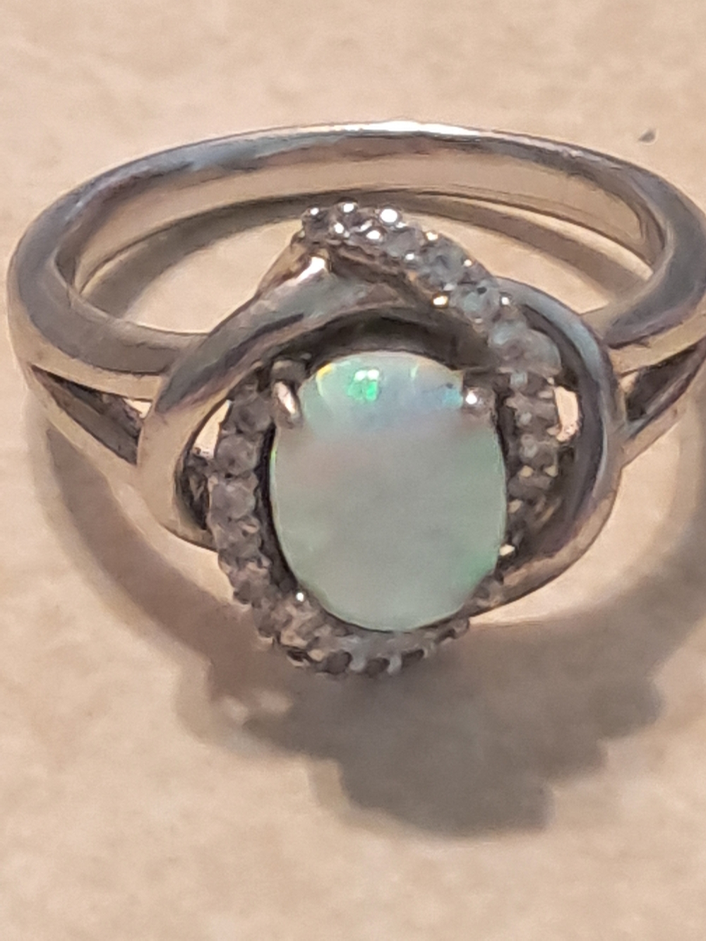 Sterling Opal Halo Ring in Iridescent White